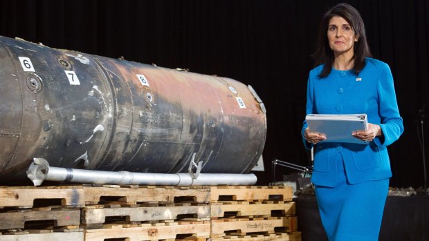 US Ambassador to the UN Nikki Haley walks past recovered remains of an Iranian rocket fired towards Saudi Arabia, during a press briefing last week.