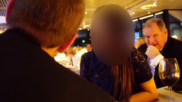 A picture of the woman seated next to the lord mayor at the Melbourne Health gala event. Her partner is in the foreground.