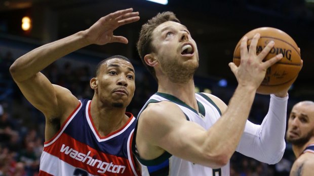 Milwaukee's Matthew Dellavedova goes up to shoot.