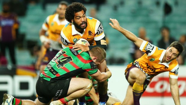 Bucking Bronco: Adam Blair is tackled during the round 25 NRL match between the South Sydney Rabbitohs and the Brisbane Broncos at Allianz Stadium.