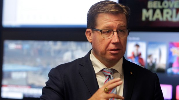 Police minister Troy Grant has been fined for using his phone behind the wheel of his car.