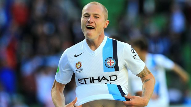 Valuable: Aaron Mooy celebrates a Melbourne City goal.