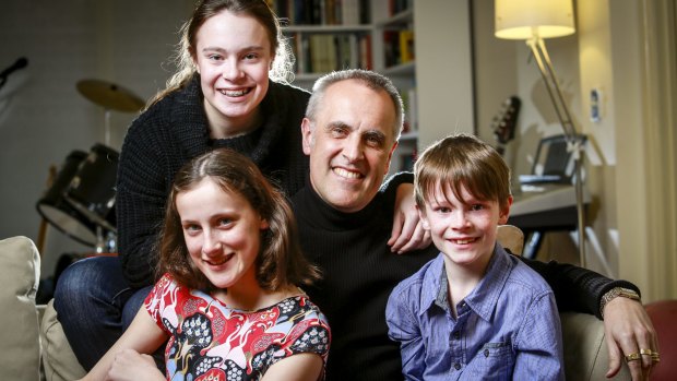 Piero Testarotta at home with his three children, Katia, 14, Milla, 12, and Xavier, 9.