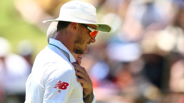 Big blow: Dale Steyn walks off after injuring his shoulder on day two of the First Test.