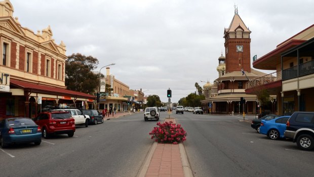 The 12-year-old boy was stopped near Broken Hill after officers saw his car's bumper trailing on the road.