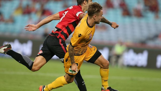 Slick finish: Adam Taggart scored a controversial goal for the Glory against the Wanderers at ANZ Stadium. 
