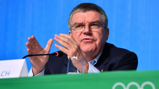 IOC president Thomas Bach says banning the entire Russian team from the Rio Games cannot be justified on legal or moral grounds.