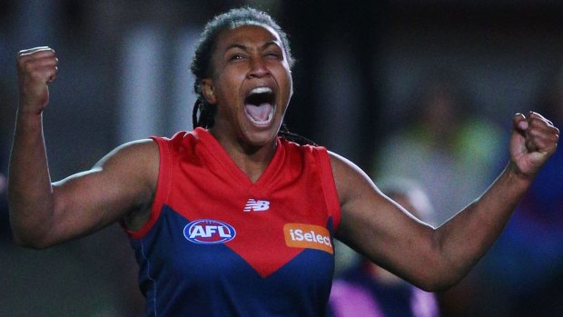 All-star: Sabrina Frederick-Traub of the Demons celebrates a goal against the Bulldogs at Whitten Oval on Saturday night.