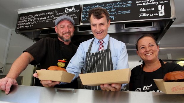 Lord Mayor of Brisbane Graham Quirk with chef Joel Chrystal and Eileen Taylor Chrystal of Brisbane food truck The Bone Lorry.