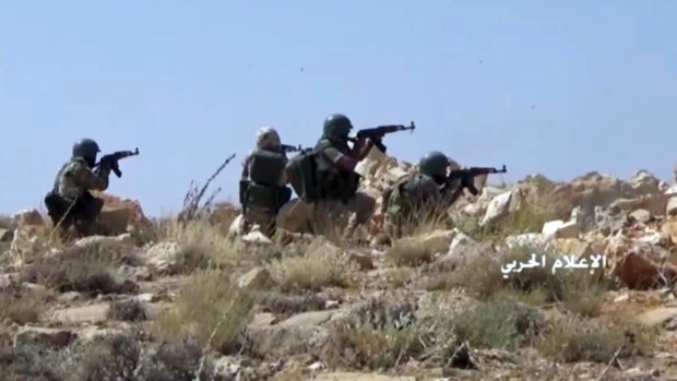 Hezbollah fighters taking position during clashes with al-Qaeda-linked militants in an area on the Lebanon-Syria border a week ago.