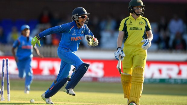 Breakthrough: Indian keeper Sushma Verma celebrates as Alex Blackwell is bowled in the World Cup semi-final.