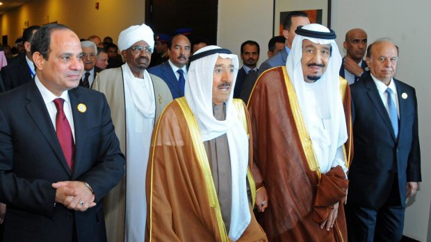 From left: Egyptian President Abdel-Fattah al-Sisi, Sudanese President Omar Hassan al-Bashir, the Emir of Kuwait,  King Salman of Saudi Arabia and Yemeni President Abed Rabbu Mansour Hadi walk to an Arab summit meeting in Sharm al-Sheikh,  Egypt, on Saturday.
