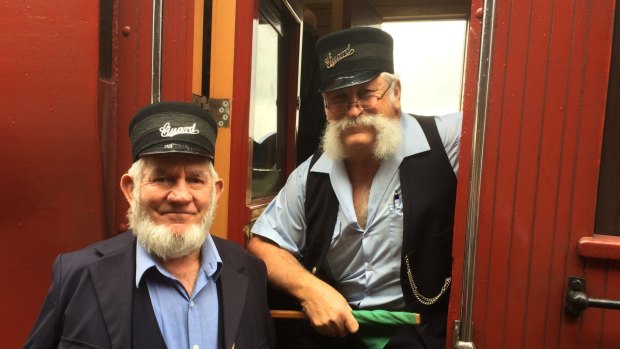 Looking the part ... Queensland rail guard Mick Saffioti, right, and a Steamfest volunteer, bound for Grandchester. 