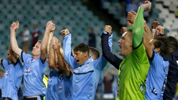 Sydney FC celebrate with the crowd after winning the round 22 match against Melbourne Victory at Allianz Stadium.