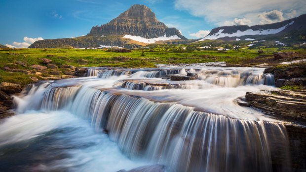 Logan Pass in Montana reveals mountains sculpted by glaciers into dramatic shapes.