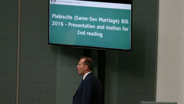 Tony Abbott arrives as Malcolm Turnbull introduces the bill.