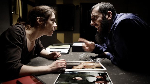 Sarah Lund (played by Sofie Grabol) with Kodmani (played by Ramadan Huseini) in a scene from the Scandinavian detective show The Killing.