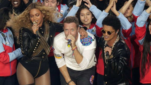 A high-powered delegation from NSW saw Beyonce, Coldplay singer Chris Martin and Bruno Mars perform at the Super Bowl before jetting off to Las Vegas and London.