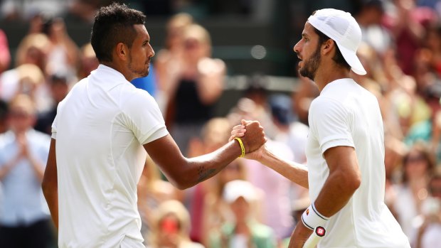 Nick Kyrgios is congratulated by Feliciano Lopez after their third round encounter.