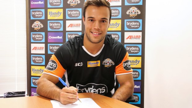 Commitment: Luke Brooks put pen to paper knowing there was uncertainty at Wests Tigers.
