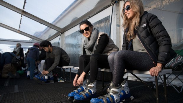 Kristel Kohn and her friend, Mara Bouninfante put on ice skates, ready to hit the rink at Bondi.