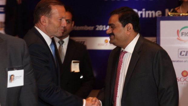 Prime Minister Tony Abbott with mining magnate Gautam Adani in Delhi in 2014. 