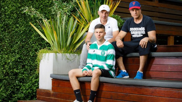 Celtic FC signing Leo Mazis with his father Peter and manager Andy Bernal. 
