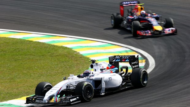 Valtteri Bottas of Williams drives ahead of Daniel Ricciardo of Red Bull Racing during practice in Sao Paulo on Friday.