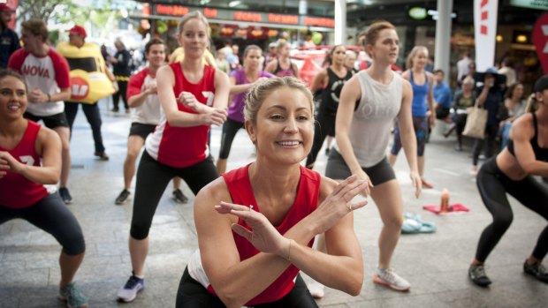 Warming the muscles at the City2South BEATcamp in the Queen Street Mall.