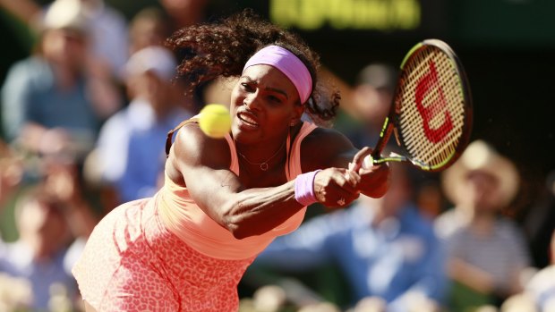 Serena Williams stretches to effect a return. 