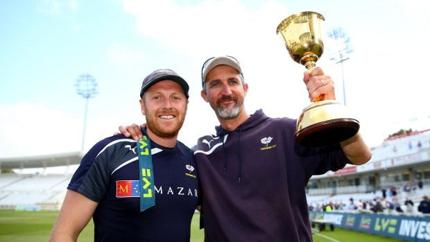 Jason Gillespie (right) with Yorkshire captain Andrew Gale after winning the county championship in November.