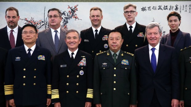 'They're going to test us': Max Baucus with US and Chinese top brass at a meeting in Beijing in November 2015. 
