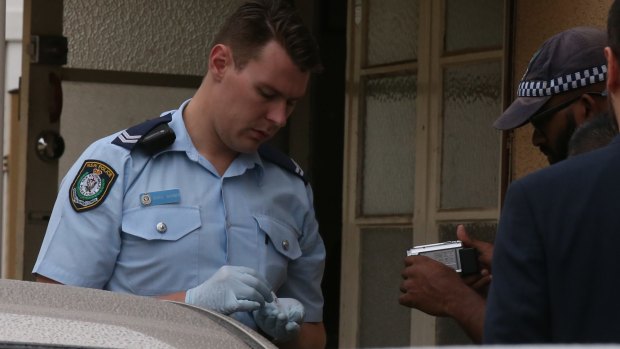 Police search Khanh Thanh Ly's house in Sydney's inner west.