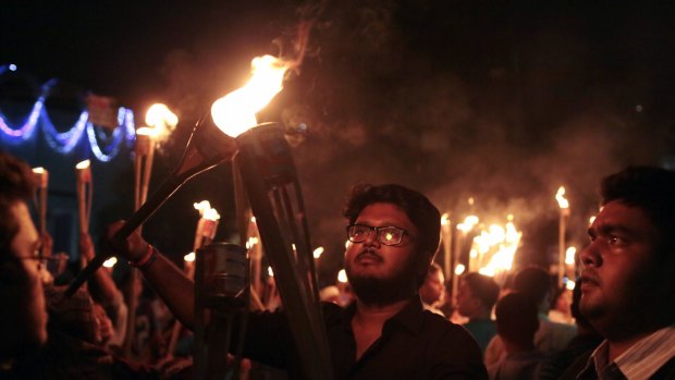 Bangladeshi activists, writers and publishers in a torch rally on Monday  held to protest against the killing of secular publisher Faisal Arefin Deepan,and  the attacks on the other publishers and bloggers in Dhaka.