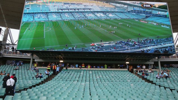 Big blue: empty seats usually occupied by The Cove during Sydney FC's 1-0 win over Newcastle on Friday night.