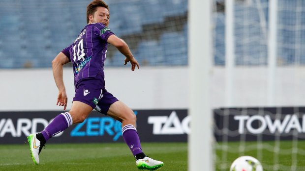 Chris Harold knocks in the second goal for Perth Glory.