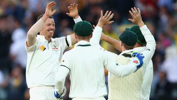 Peter Siddle celebrates after dismissing Doug Bracewell, his 200th scalp in Test cricket.