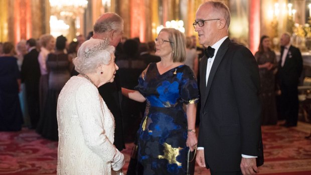 Britain's Queen Elizabeth II and Prince Charles greet Australia's Prime Minister Malcolm Turnbull and his wife Lucy in the Blue Drawing Room at Buckingham Palace