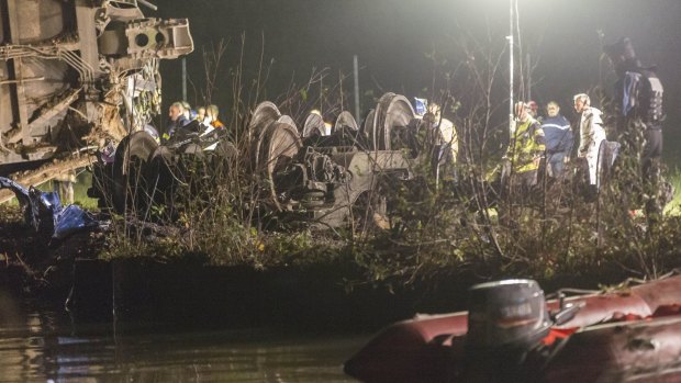 Rescue workers at the site of the crash in Eckwersheim, near Strasbourg, eastern France.