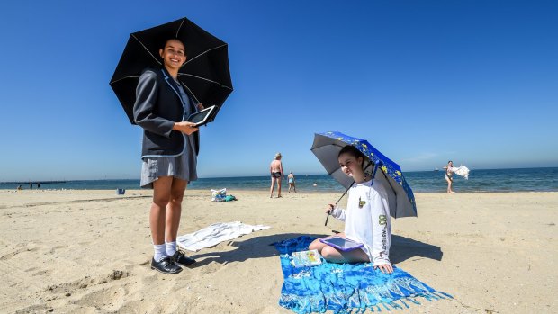 Albert Park College students Sienna Di Benedetto and Christina Burke Broderick on South Melbourne beach.