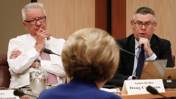 Senators Murray Watt and Doug Cameron put questions to Employment Minister Michaelia Cash during a Senate estimates hearing at Parliament House in Canberra on Wednesday.