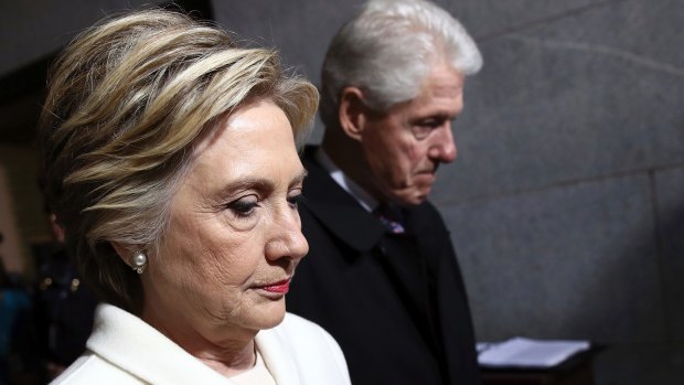 Facing up to failure: Hillary Clinton and her husband Bill arrive for the inauguration of US President Donald Trump in January.