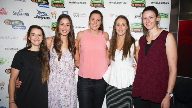 Lauren Scherf, centre, is set to join the Canberra Capitals.