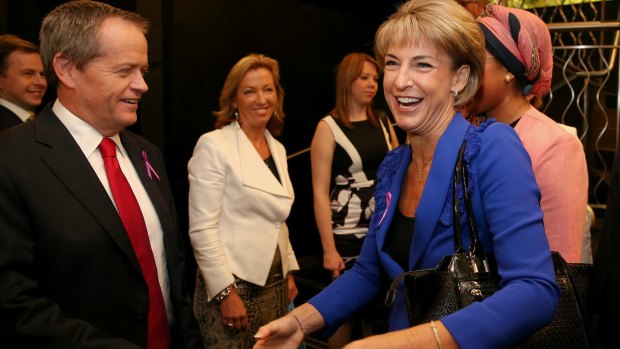 Opposition Leader Bill Shorten greets senator Michaela Cash at the International Women's Day UN Women Australia Forum at the National Press Club.