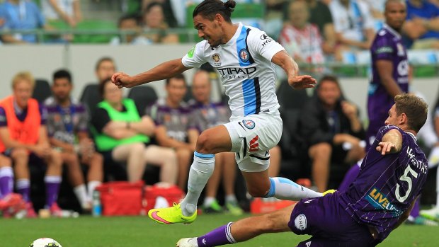 Moving ahead: David Williams of Melbourne City evades Rostyn Griffiths.