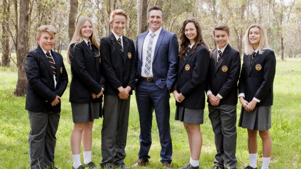 Principal Darren Cox with students from St. Philip's Christian College Cessnock.