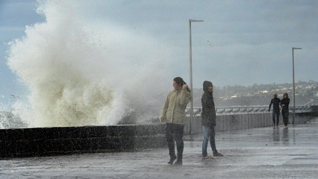 Large waves hit the Mornington Pier.