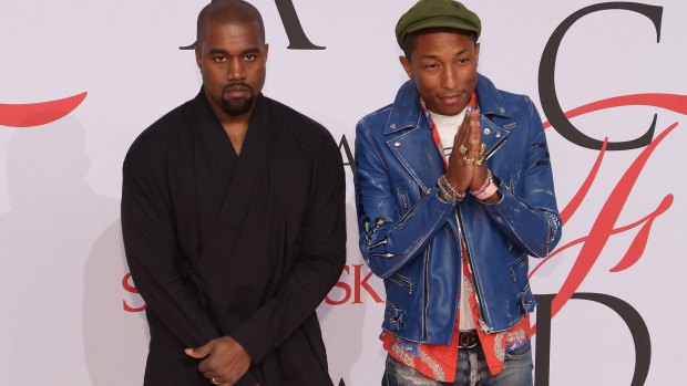 A "chipper" Kanye West and Pharrell Williams attend the 2015 CFDA Awards in New York.