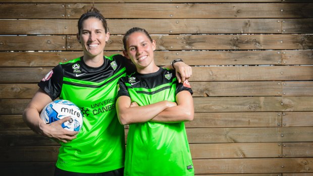 Canberra United foundation players Ash Sykes and Caitlin Munoz. 