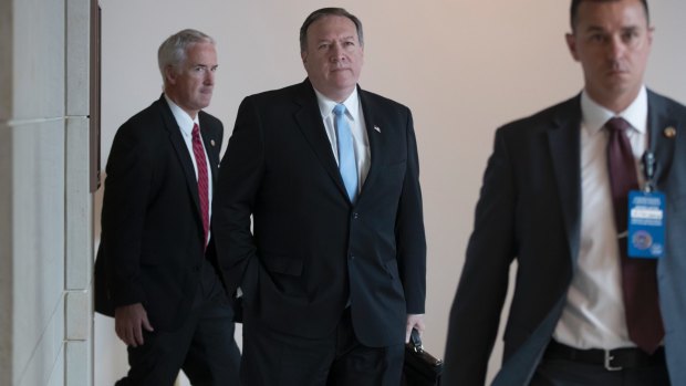 CIA Director Mike Pompeo, centre, has criticised any nuclear deal with Iran.